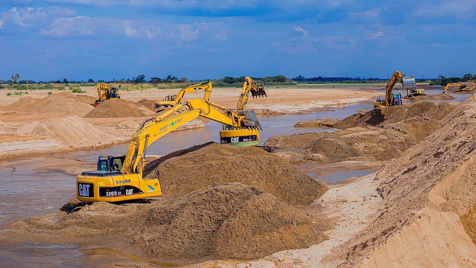 Ellyz machines working across a wide river works site in Tanzania