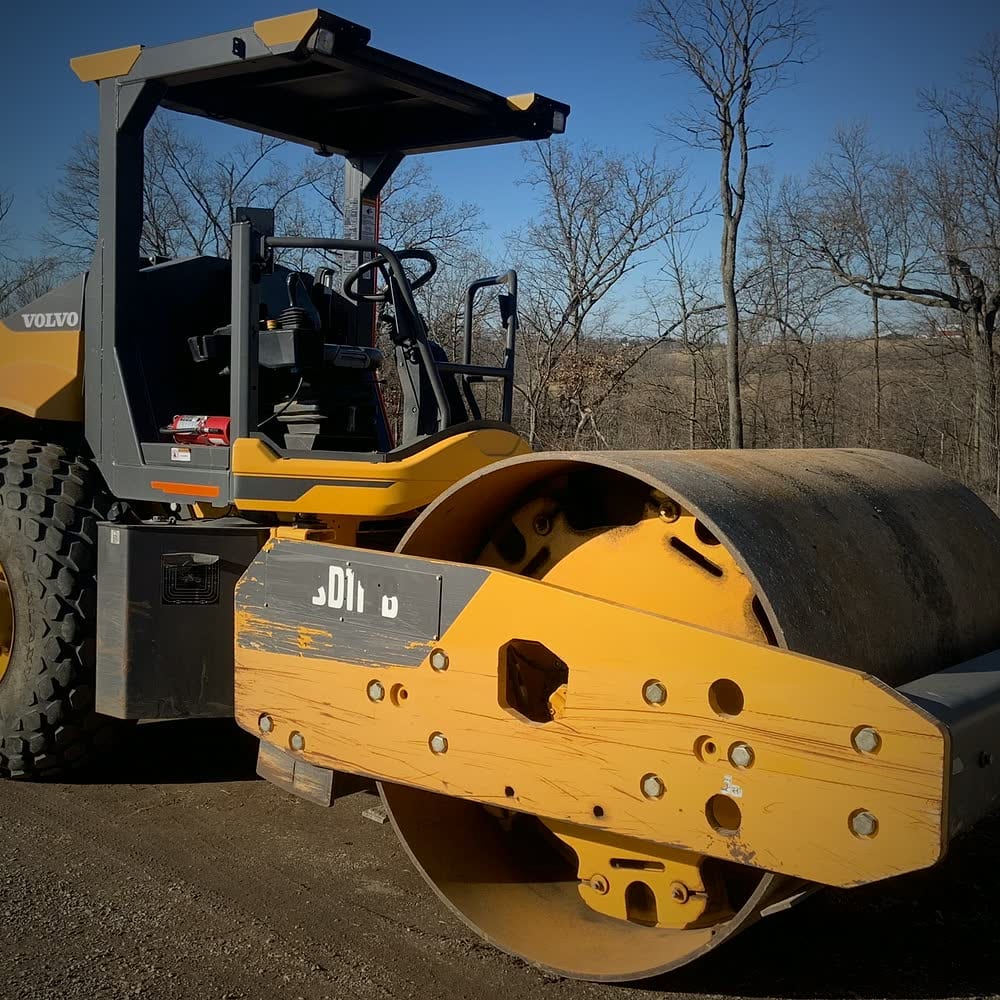 Single-drum compaction roller on a prepared surface
